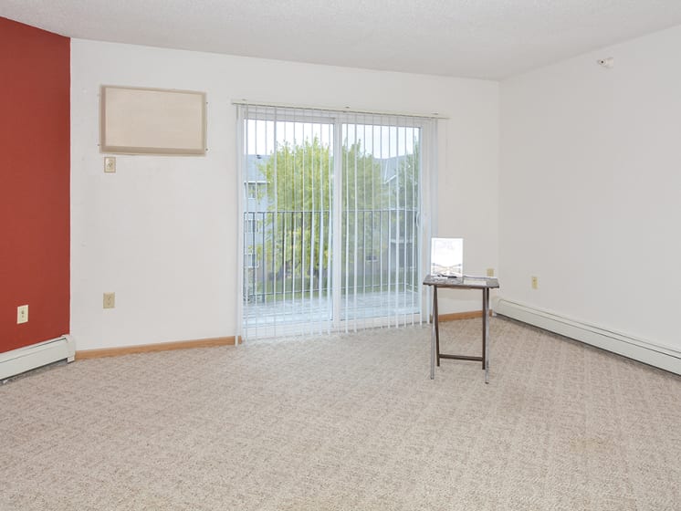 Carpeted Living Rooms with Patio/Balcony Access
